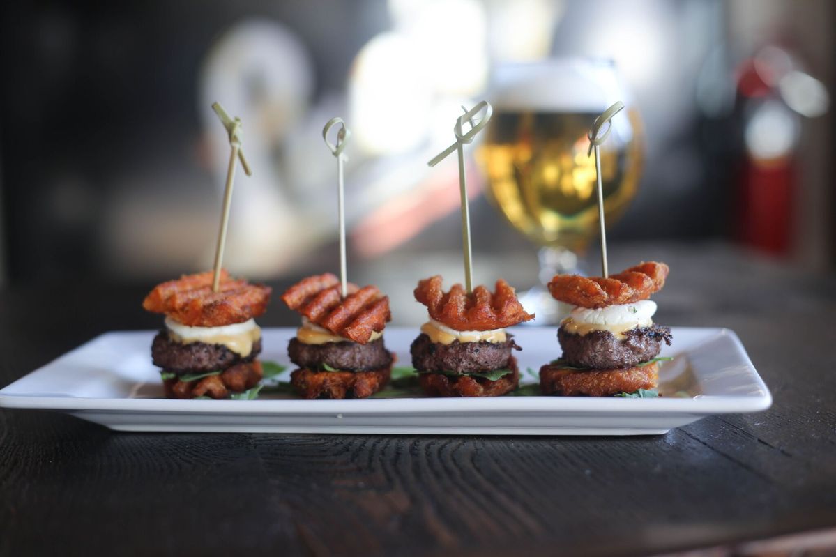 Discover Global Flavors at The West Hill Tavern